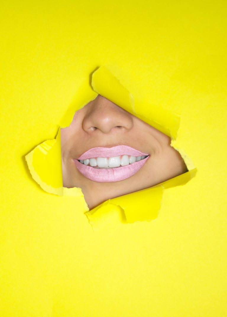a person wearing a yellow shirt