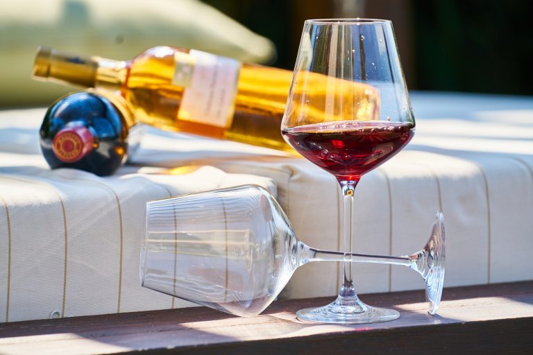 a glass of wine and a bottle